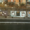 Mural antivertice G7. Fermiamo il treno dei problemi. - Via Cintia - Soccavo - Napoli. I licenziamenti, il Fondo Monetario Internazionale, l