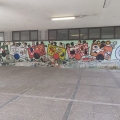 “Il Treno dei diritti va troppo lento” Mural alla Scuola Media “Carlo Levi” (Scampia, Napoli), foto del maggio 2022. Vista d’insieme. <em>Ph. Patrizia Palumbo.</em>