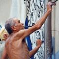 Felice a Genova, mural contro il G8, 2001. Da neos.net