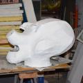 Trump-pig riciclato, secondo rivestimento per la maschera recuperata dopo il falò del carnevale 2017,  laboratori per il 36° Corteo di Carnevale di Scampia, gennaio 2018. Ph. Martina Pignataro.