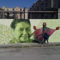 Incontro tra la maschera di Rigoberta Menchù Tum e il volto dipinto sul muro della pace da Raro, Biodpi e Gambian Crew per il “Progetto Pangea” al termine 37° Corteo di Carnevale di Scampia, domenica 3 marzo 2019. Ph