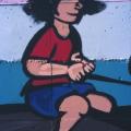 Scuola Virgilio III, Scampìa (Napoli), 1985. Particolare: bambino che cavalca la lumaca.