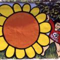 Il fiore e il simbolo del GRIDAS (particolare).