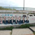 Punta Vagno, Genova, 2001: murales contro il G8. Particolare dei "G8". ph: Aniello Gentile, 2006.