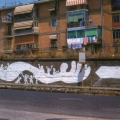 Mural antivertice G7. Fermiamo il treno dei problemi. - Via Cintia - Soccavo - Napoli. Mural sospeso dalla polizia per “Deterioramento aggravato”.