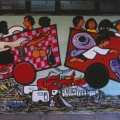 “Il Treno dei diritti va troppo lento” Mural alla Scuola Media “Carlo Levi” (Scampia, Napoli), 1999. 