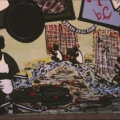 “Il Treno dei diritti va troppo lento” Mural alla Scuola Media “Carlo Levi” (Scampia, Napoli), 1999. Lo sfruttamento dei bambini lavoratori (particolare).